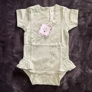 NWT Kate Quinn ruffle leg bodysuit
